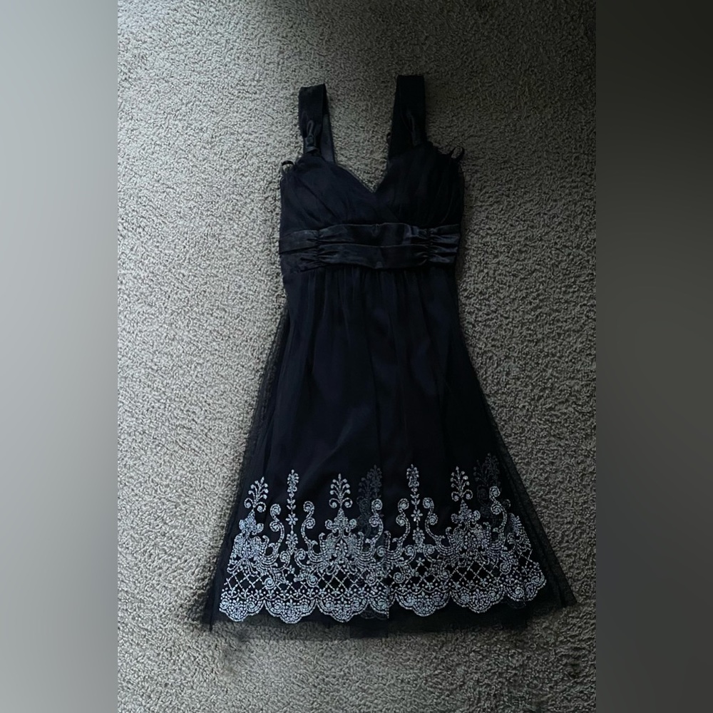 Black dress silk embroidered with padding